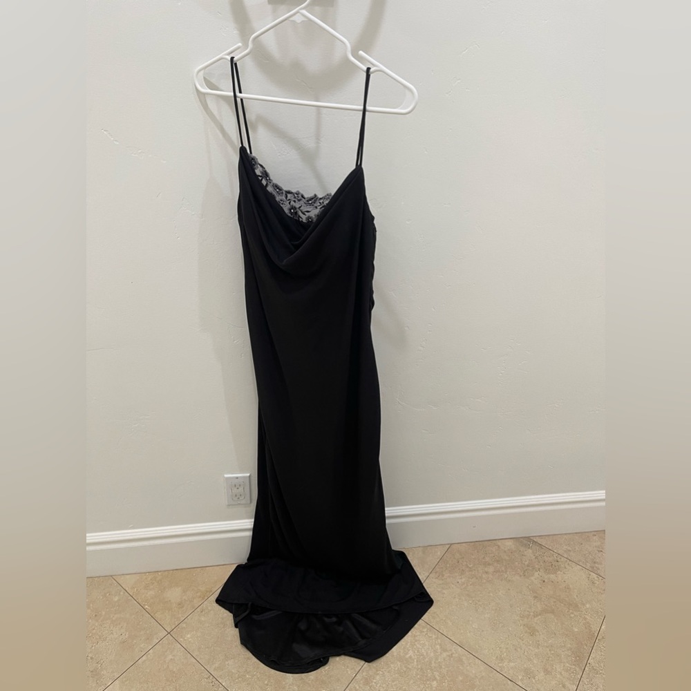 Black formal dress. Perfect for a wedding or gala.